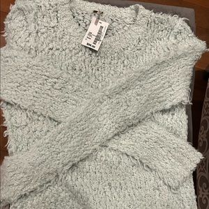 New with tags free people sweater. Mint green in color.